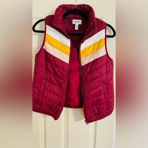 Arizona puffer vest with multicolored stripe. Gently used in good condition